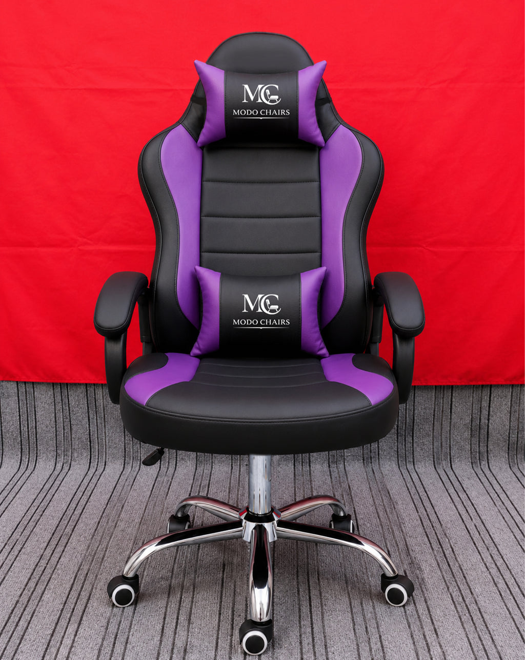 Purple Modo Phantom X gaming chair with ergonomic design, adjustable armrests, and high-back support for comfortable gaming sessions.