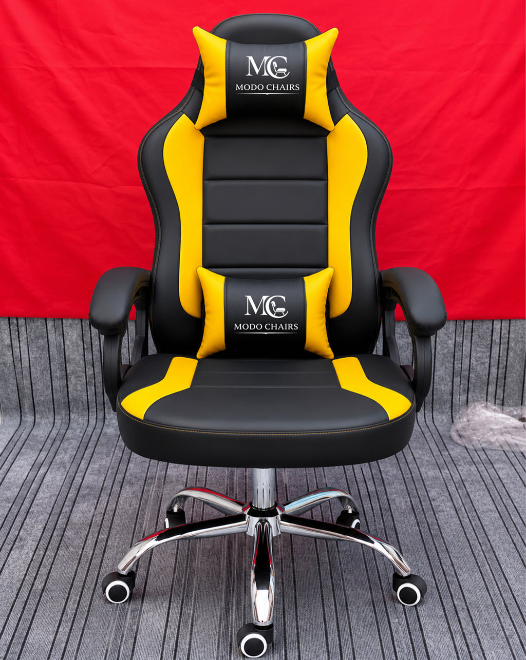 Yellow Modo Phantom X gaming chair with ergonomic design and adjustable features, ideal for comfortable gaming sessions.
